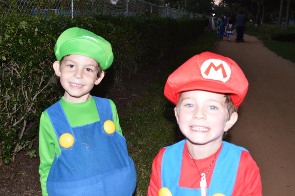 Boys dressed in Luigi and Mario costumes